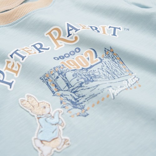 可愛比得滾邊拼接造型上衣