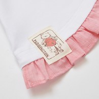 柏靈頓之旅不對稱剪裁花邊拼接上衣